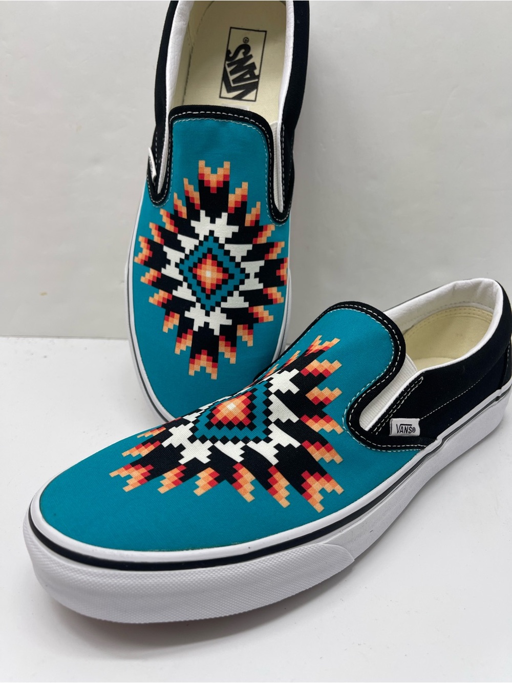 Vans Men’s Classic Slip-On Desert Vibes Teal Blue/True White
Sneakers Aztec - Picture 15 of 16